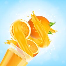 Orange Juice Splash With Glass And Orange Fruit Royalty Free Stock Photos