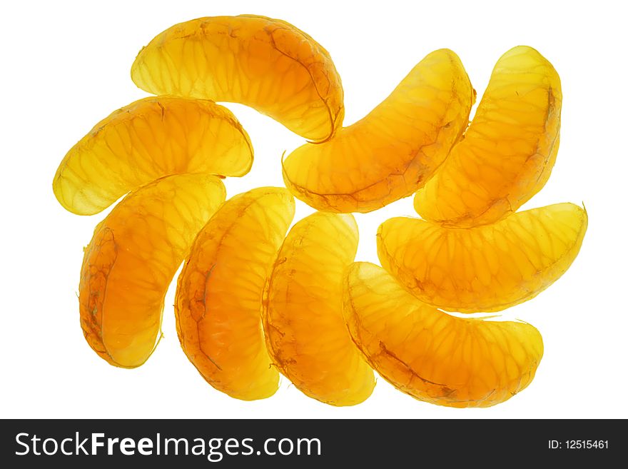 Transparent juicy sweet tasty segments of a tangerine. Isolated on white. Transparent juicy sweet tasty segments of a tangerine. Isolated on white