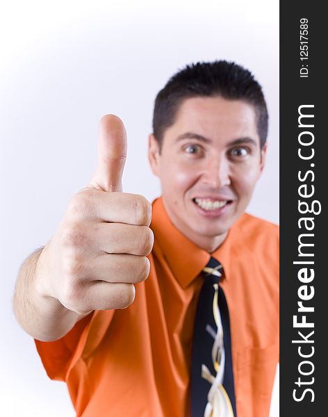 Happy businessman in orange shirt showing his finger