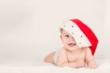 Xmas Card With Cute Baby Girl With Santa Hat On Beige Airy Briht Background With Copy Space Stock Photos