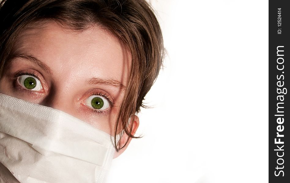 Woman With Big Green Eyes Wearing Medical Mask