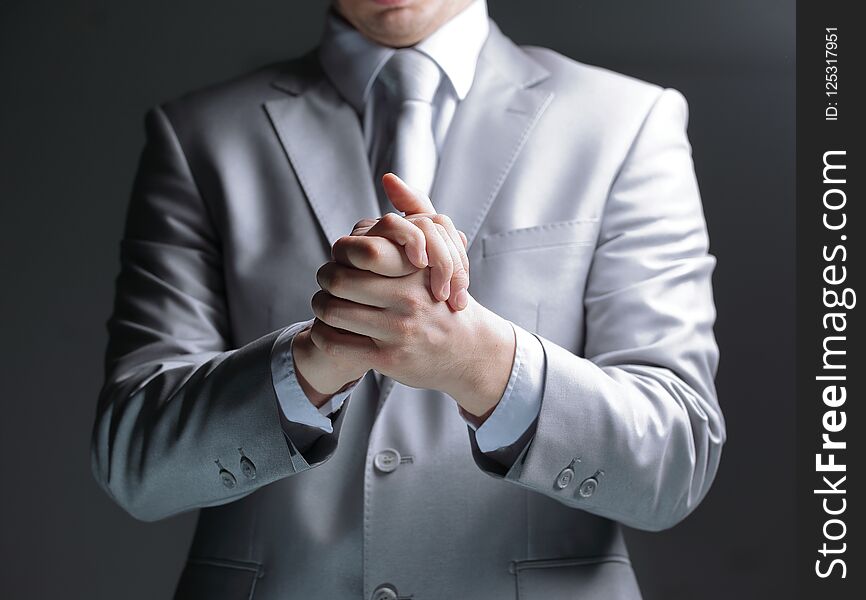 Close Up.businessman Showing Gesture Of Support.isolated On Black Background