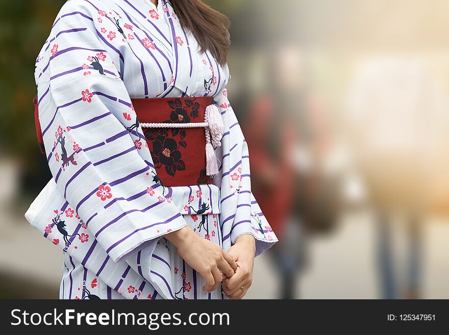 Young Girl Wearing Japanese Kimono Standing In Front Of Sensoji