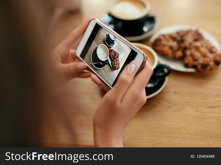 Food Photo On Mobile Phone In Cafe. Woman Hands Making Photos Of Coffee On Smartphone In Restaurant. High Resolution