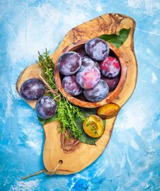 Plums On Wooden Table Close-up. Healthy Diet Royalty Free Stock Photography