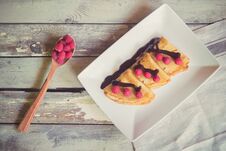 Crepes With Fresh Raspberries And Chocolate Syrop. Royalty Free Stock Photos