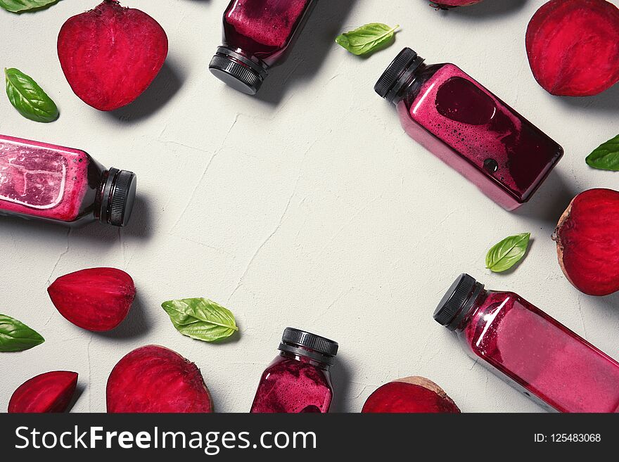 Flat Lay Composition With Beet Smoothies On Light Background