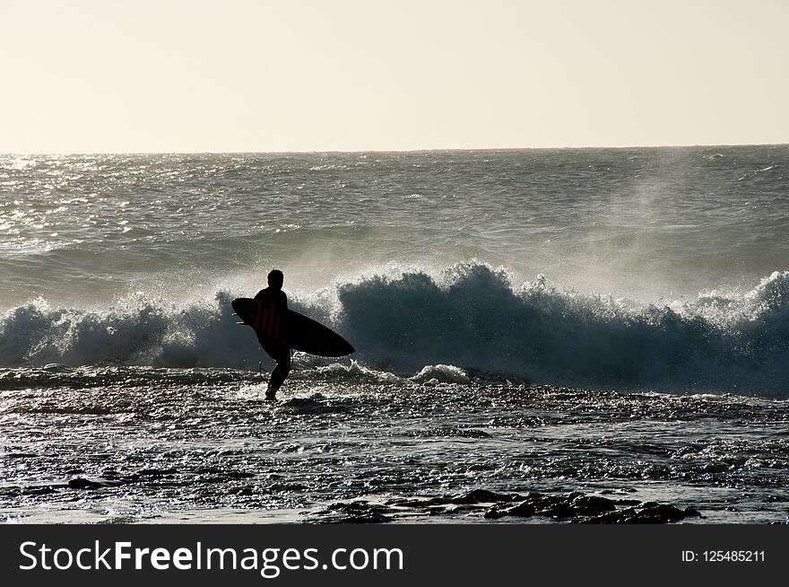 Surfer Silhouette in Indian Ocean