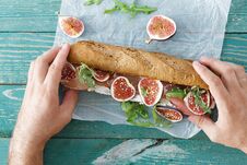 Outdoor Man Eating Sandwich Prosciutto Mascarpone Cheese Figs To Royalty Free Stock Image Outdoor Man Eating Sandwich Prosciutto Mascarpone Cheese Figs To Royalty Free Stock Image
