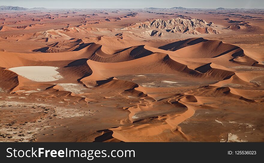 Namib desert aerial view with dunes and sand