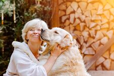 Pretty Blonde Woman Playing With Her Dog Golden Retriever Stock Images Pretty Blonde Woman Playing With Her Dog Golden Retriever Stock Images