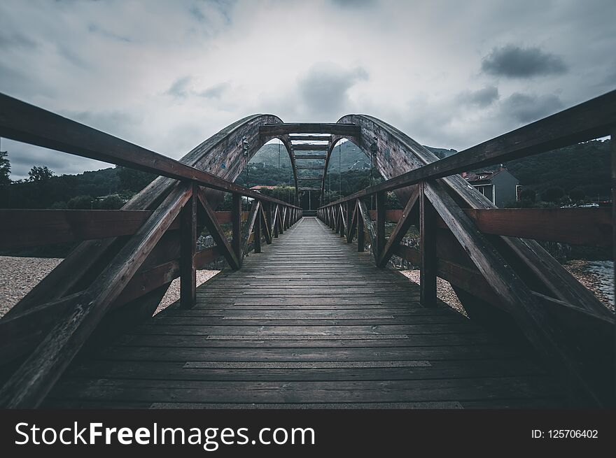 The wooden bridge. Bridge across the river
