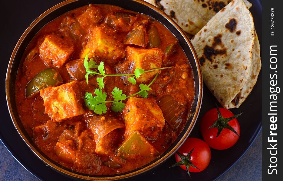 Indian Paneer Curry Served With Roti