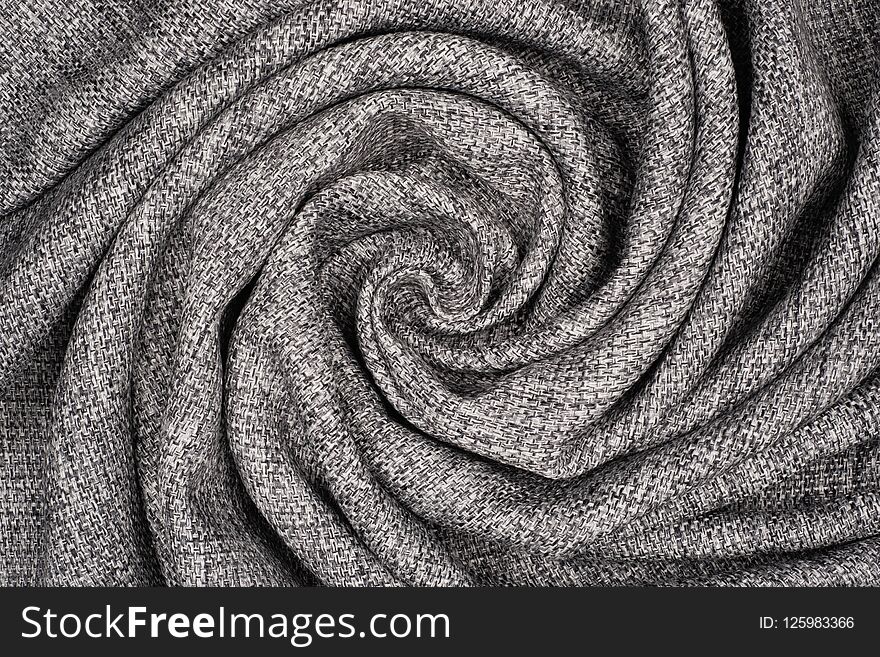 Textile and texture concept - close up of crumpled fabric background. Abstract background, empty template. Top view.