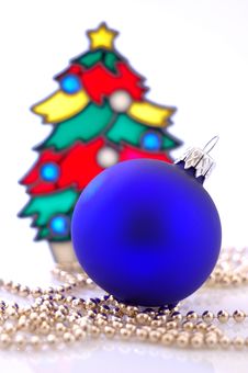 A Glass Ball And A Christmas Tree Royalty Free Stock Photos