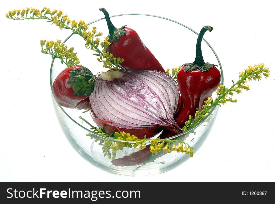 Red hot chili and red onion in glass. Red hot chili and red onion in glass