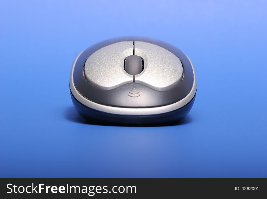 Wireless Mouse on blue background