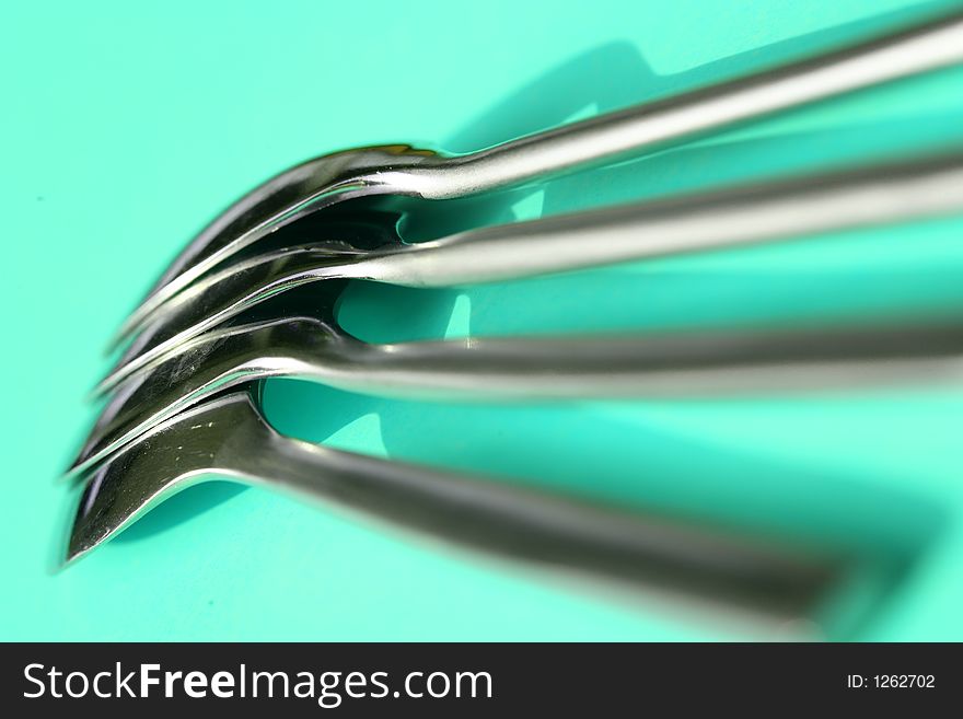 Spoons against a blue background