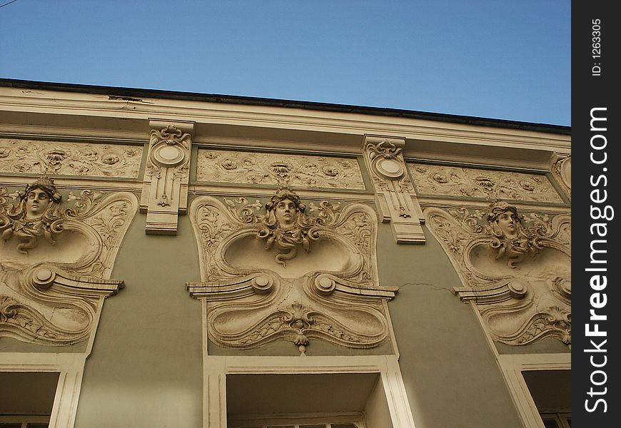 Three bas-reliefs of jellyfish Gorgon on a building (Moscow)