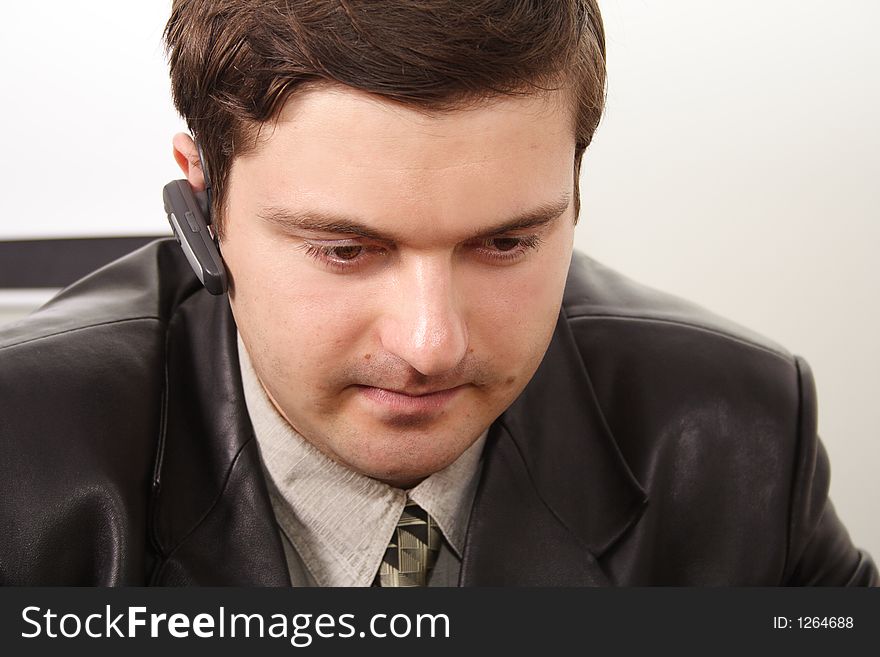 Portrait of a businessman in a working process. Portrait of a businessman in a working process