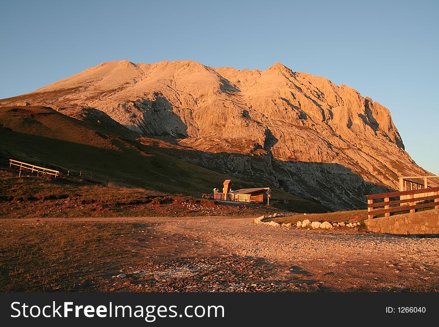 Glorious sunset over field and mountains. Glorious sunset over field and mountains