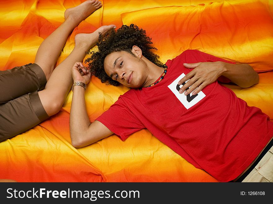 Young couple laying on the bed. Young couple laying on the bed