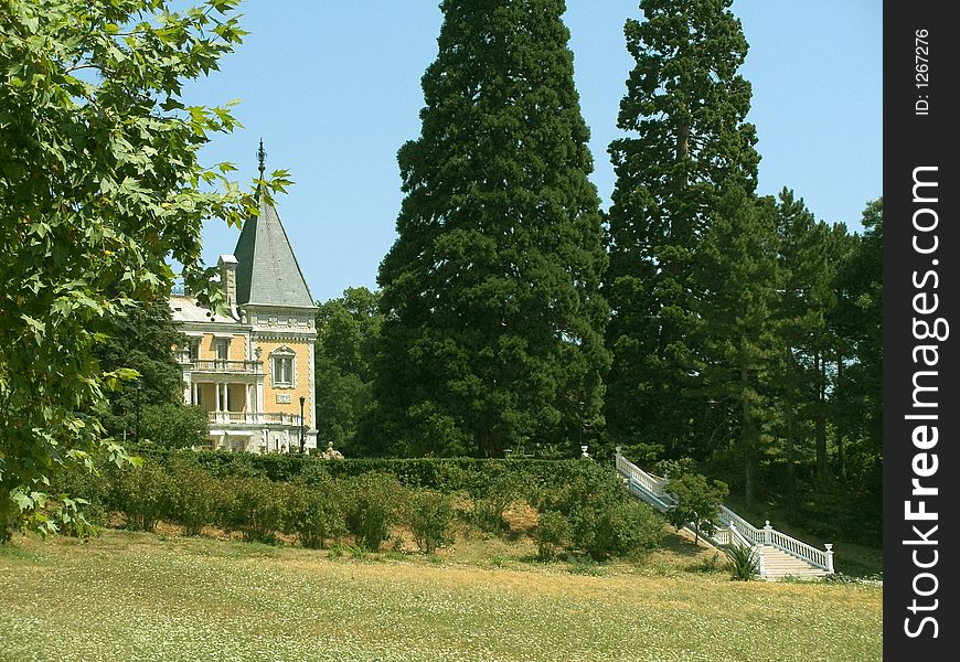 Old castle, trees and staircase