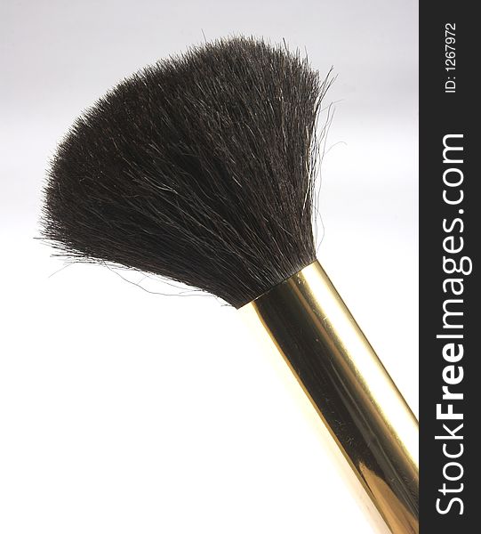 Cosmetic brush isolated in white