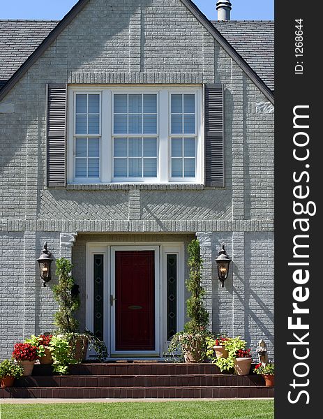 A photograph taken of a residential house entrance.