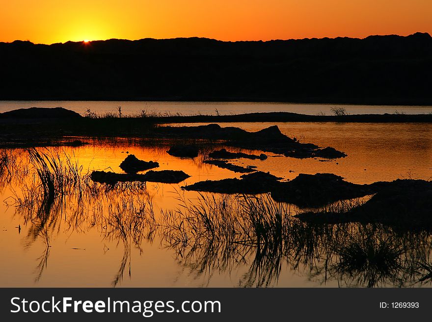 Sunset Reflection In Natural Lake