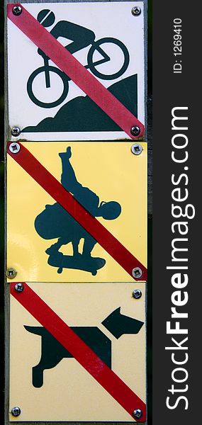 Three Signs posted forbidding recreational activities. Three Signs posted forbidding recreational activities