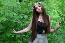 Free A Forest Picture Of A Beautiful Young Brunette Of European Appearance With Dark Brown Eyes And Large Lips Stock Photos - 126017183