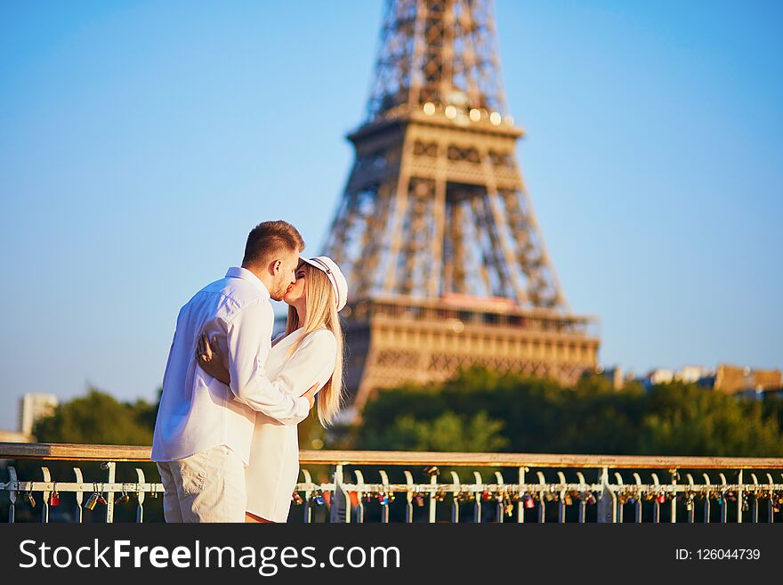 Romantic Couple Having A Date Near The Eiffel Tower