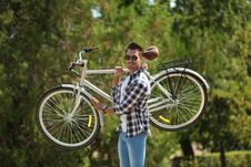 Handsome Young Hipster Man With Bicycle Royalty Free Stock Photography