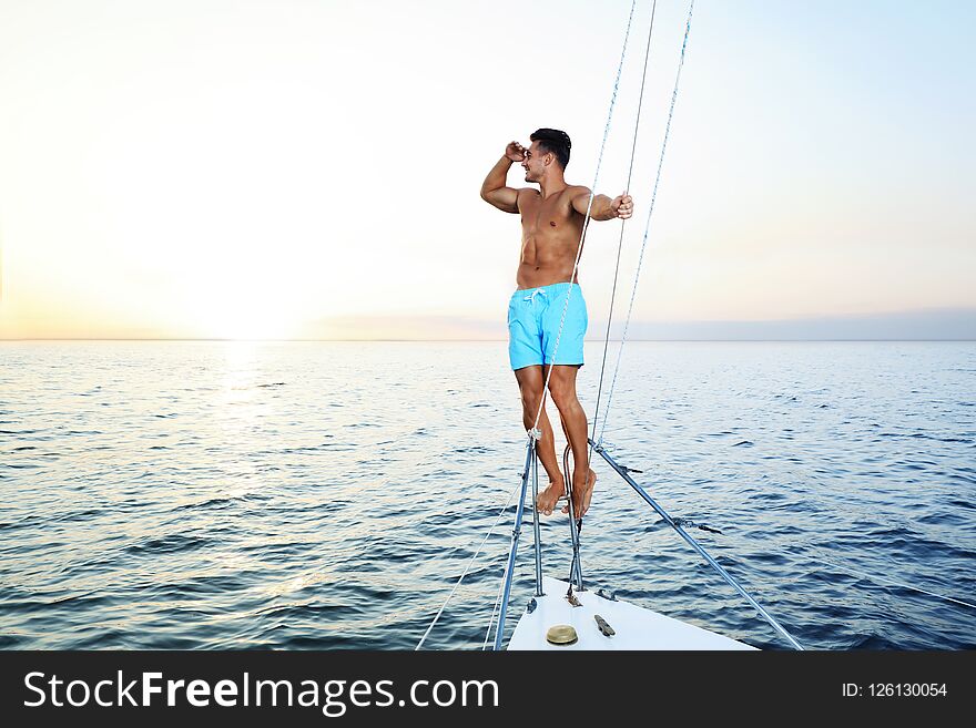Young wealthy man on yacht
