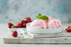 Ice Cream Scoops Of Delicious Ice-cream And Strawberry On White Background. Scoops Of Delicious Ice-cream And Strawberry On White Royalty Free Stock Image Ice Cream Scoops Of Delicious Ice-cream And Strawberry On White Background. Scoops Of Delicious Ice-cream And Strawberry On White Royalty Free Stock Image