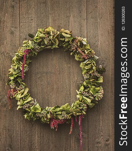 Rustic, decorative wreath hanging on door or laying on table. Rustic, decorative wreath hanging on door or laying on table.