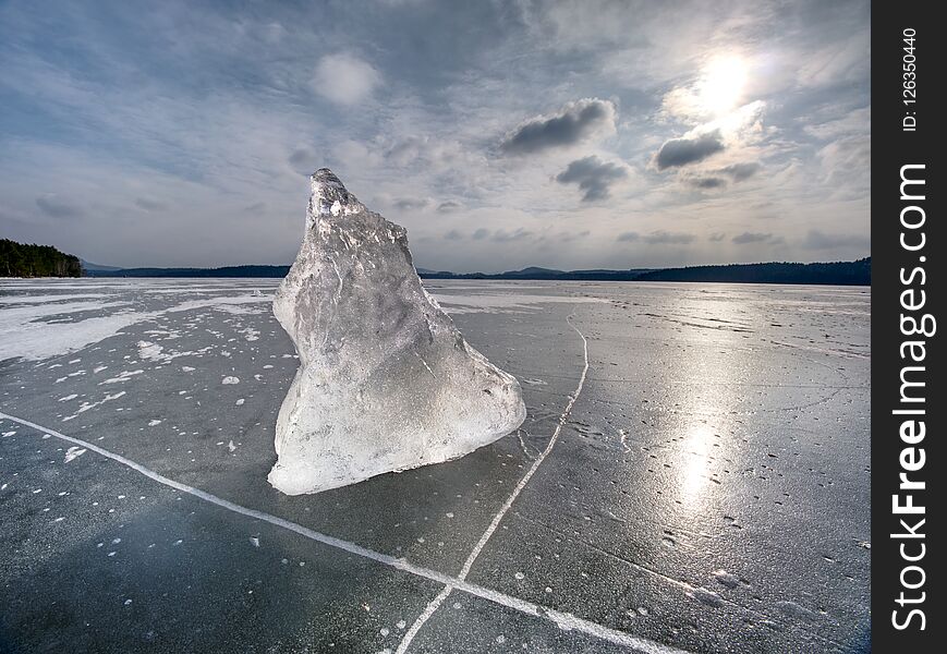 Melting Of Pieces Of Thick Ice On Frozen Sea. Hot Sun