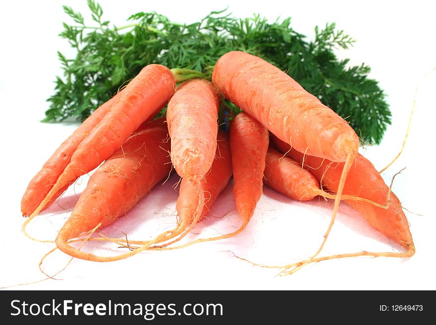 A bunch of carrots on a white background