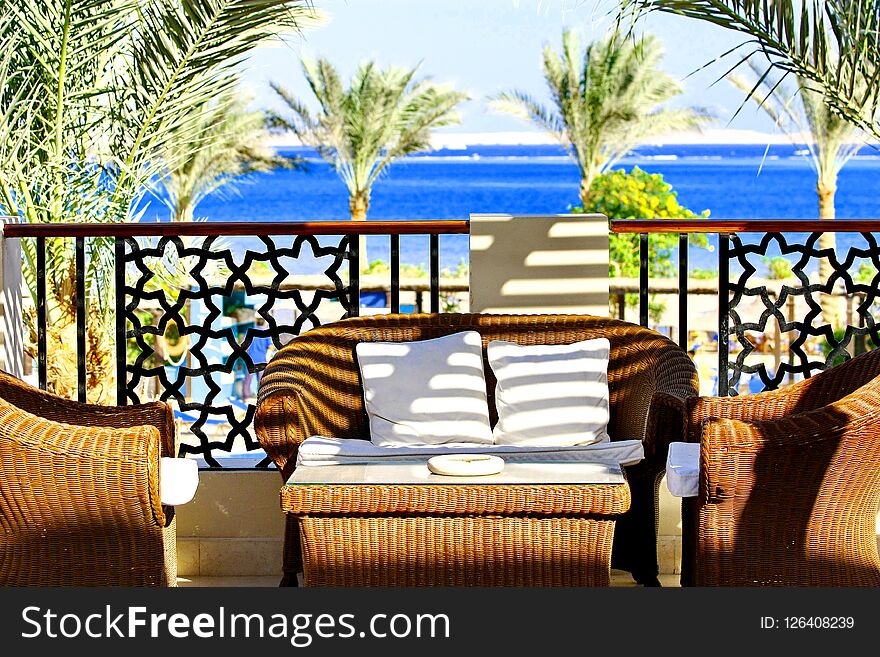 Villa Terrace With Wicker Furniture And Sea View