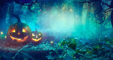 Halloween Theme With Pumpkins And Dark Forest. Halloween Design Stock Photo