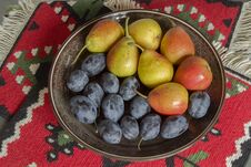 Still Life With Plums And Pears Royalty Free Stock Photo