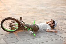 Little Boy Fallen Off His Bicycle Royalty Free Stock Image