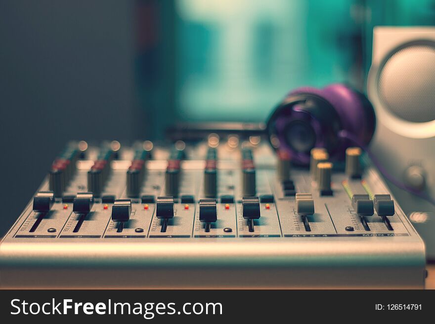 Sound mixer control panel in sound studio