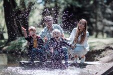 Happy Family Having Fun On The Lake. Stock Photos
