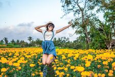 Close Up Portrait Of Happy And Beautiful Young Woman Relaxing Enjoying The Fresh Beauty Of Gorgeous Orange Marigold Royalty Free Stock Image Close Up Portrait Of Happy And Beautiful Young Woman Relaxing Enjoying The Fresh Beauty Of Gorgeous Orange Marigold Royalty Free Stock Image