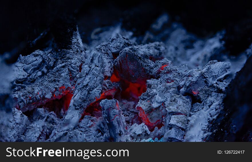 Bonfire fire charcoal texture background close up. Bonfire fire charcoal texture background close up