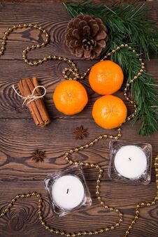 Christmas Background - Spruce Branches With Cones, Mandarins Cinnamon, Star Anise, Christmas Decor. Flat Lay, Empty Space Royalty Free Stock Images