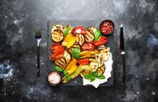 Grilled Multicolored Vegetables, Aubergines, Zucchini, Pepper Wi Royalty Free Stock Photography