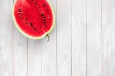 Watermelon On A Light Rustic Wooden Background Top View. Royalty Free Stock Photo